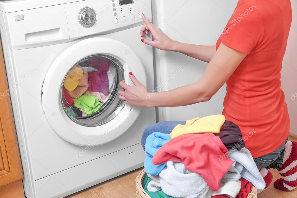 Woman and a washing machine.