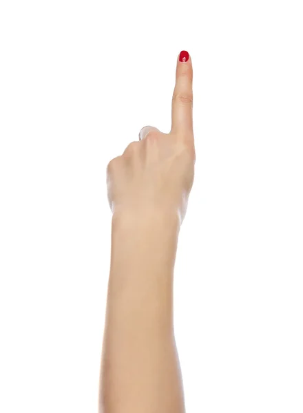 Dedo femenino levantado hacia arriba — Foto de Stock