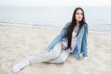 Young girl on the Baltic sea beach