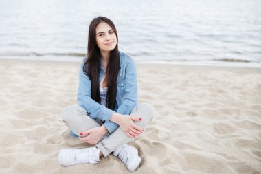 Young girl on the Baltic sea beach