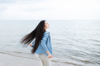 Young girl on the Baltic sea beach