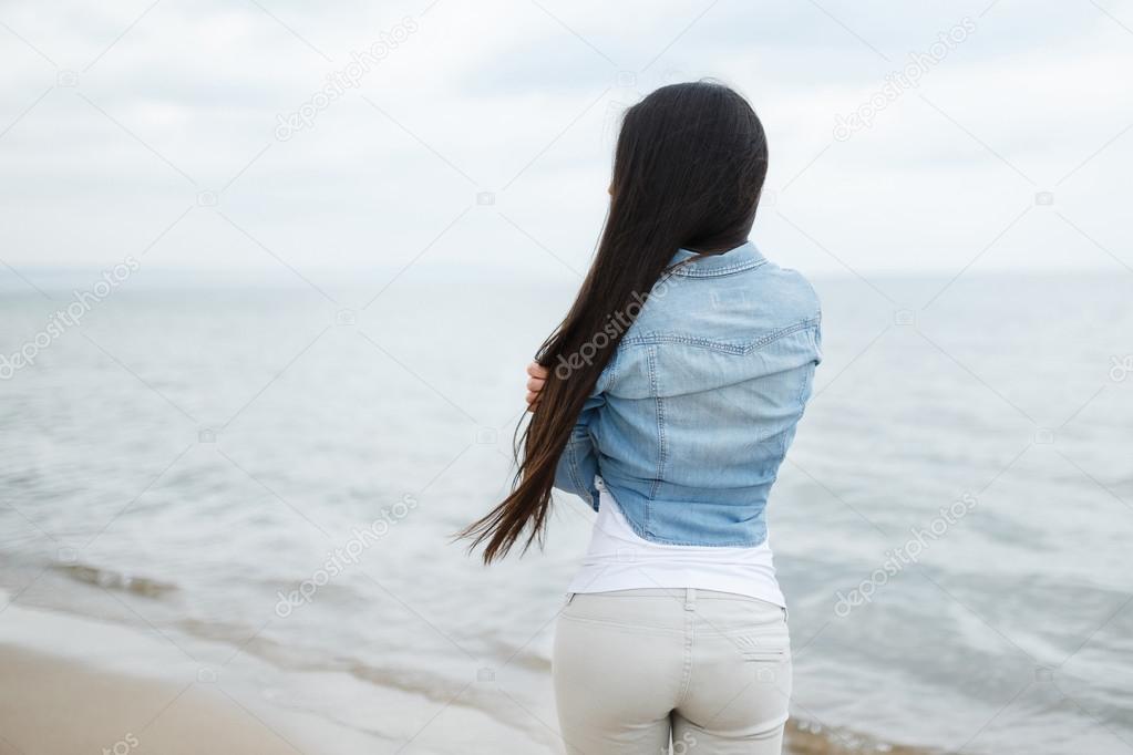 Young girl on the Baltic sea beach