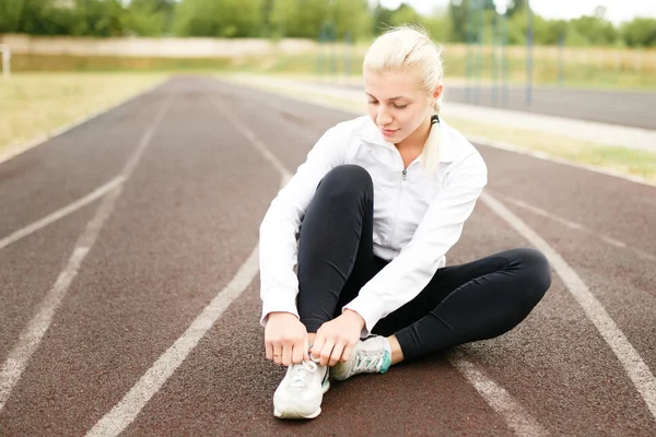 Athletic woman jogging in the evening.