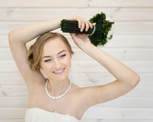 Happy bride in a dress — Stock Photo, Image
