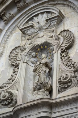 Carved figurines on the facade of the Iglesia de la Compania, Quito, Ecuador