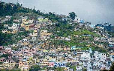 Colorful Quito suburbs on the hills above the Old Town, Qioto, Ecuador