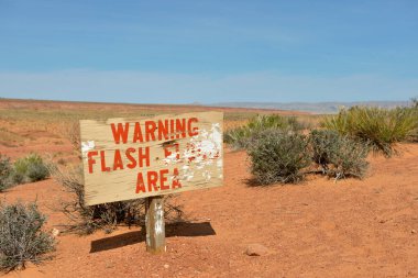 Warning Flash Flood Area sign at Lower Antelope Canyon, Hasdestwazi, LeChee Chapter, Navajo Nation, Arizona clipart