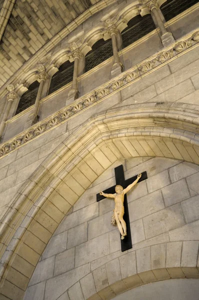 Crucifix on the interior of Notre Dame Cathedral, Paris, Ile-de-France, France