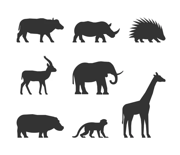 Vector conjunto negro de siluetas de animales africanos . — Vector de stock