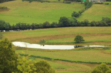 İskoçya 'nın tepelerinden derelere, nehirlere ve göllere bir manzara