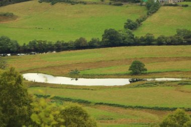 İskoçya 'nın tepelerinden derelere, nehirlere ve göllere bir manzara