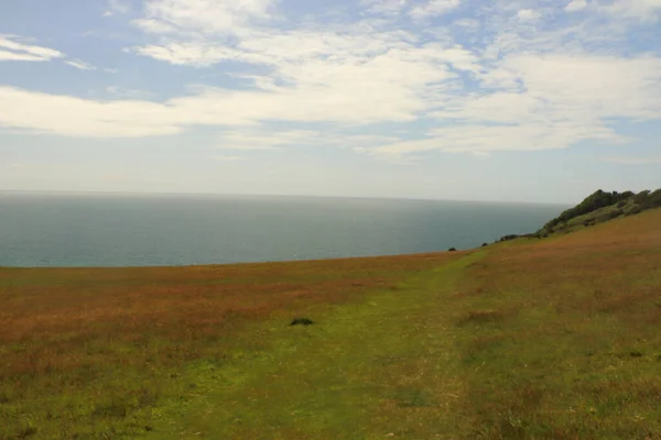 Felhők Sziklák Felett Víz Cornish Partjainál — Stock Fotó