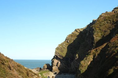 Heddon Vadisi 'nin ulusal güven bölgesi, Heddon' un ağzındaki sağanak yağmurun ardından Kuzey Devon 'daki Heddons Ağzı' nda akan nehirle dolu.