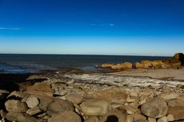 Heddon Vadisi 'nin ulusal güven bölgesi, Heddon' un ağzındaki sağanak yağmurun ardından Kuzey Devon 'daki Heddons Ağzı' nda akan nehirle dolu.