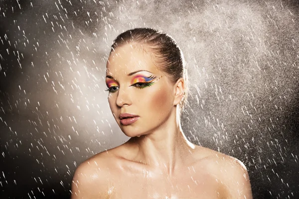 Beautiful woman in water drops — Stock Photo, Image