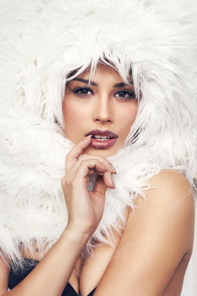 beautiful woman in white fur