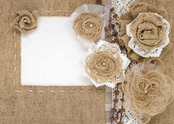 The framework is made of burlap and roses with space for text — Stock Photo, Image