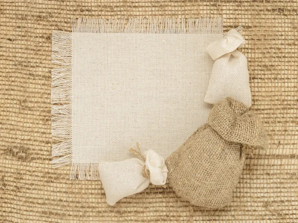 Framework made of burlap with the line and place for your text — Stock Photo, Image