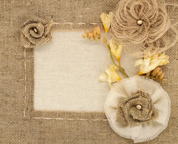 The framework is made of burlap and roses with space for text — Stock Photo, Image