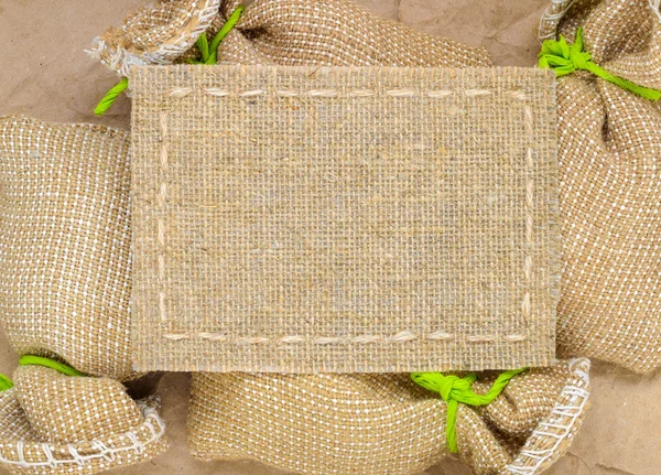 Burlap grosseiro texturizado com espaço para texto — Fotografia de Stock