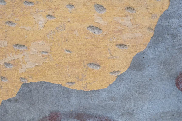 Muro de hormigón con viejo yeso despostillado, abstracto concreto