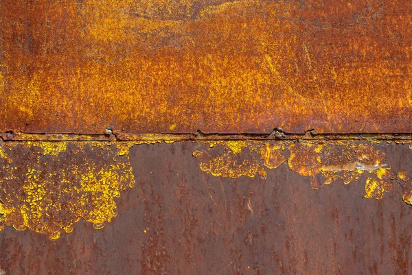 Surface of rusty iron with remnants of old paint texture background — Stock Photo, Image