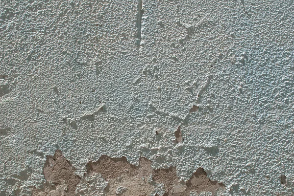 Chipped paint on an old plaster wall texture background — Stock Photo, Image