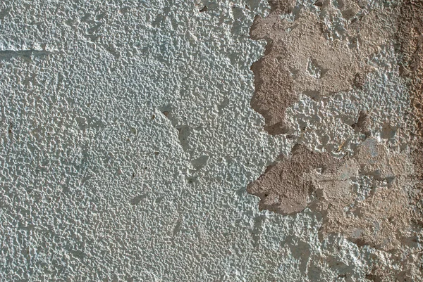 Chipped paint on an old plaster wall texture background — Stock Photo, Image