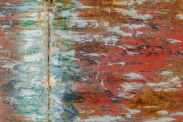 Surface of rusty iron with remnants of old paint texture background — Stock Photo, Image