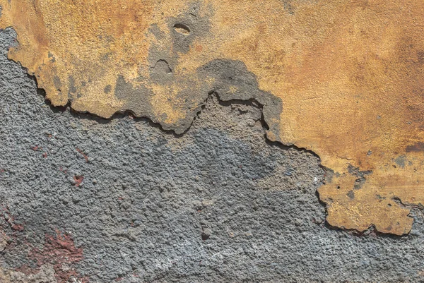 Viejo muro de hormigón envejecido con daños y grietas textura fondo — Foto de Stock