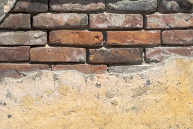 tuğla duvar doku arka plan üzerinde eski yontma sıva