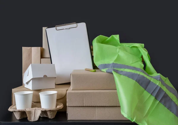 Workplace Delivery Service Lot Boxes Take Away Coffee Green Vest — Stock Photo, Image