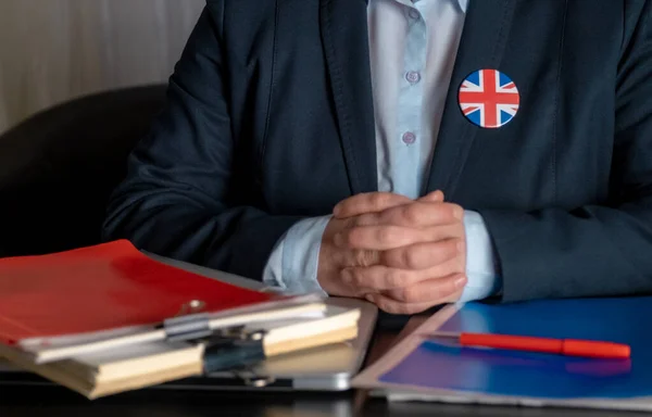 Lawyer or Office Employee or Civil Servant near his Workplace with Great Britain Flag on a Jacket Icon