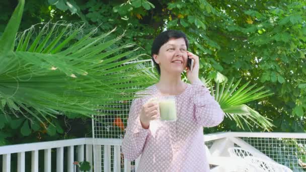 Middle Aged Woman Hold Glass Cup Green Matcha Latte Coffee — Stock Video