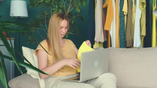 Middle Aged Blond Woman Sitting Sofa Communicates Online Laptop — Stock Video