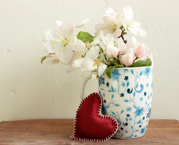 Spring flowers with heart — Stock Photo, Image