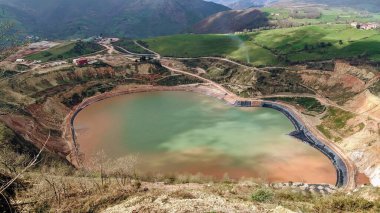 Orovalle Minerals, gold mining in Boins valley, Belmonte de Miranda, Asturias, Spain clipart