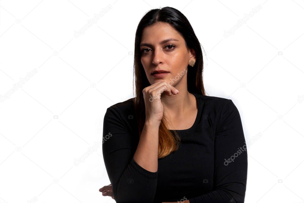 Young business latina woman isolated against a white background confident, touching chin with hand.