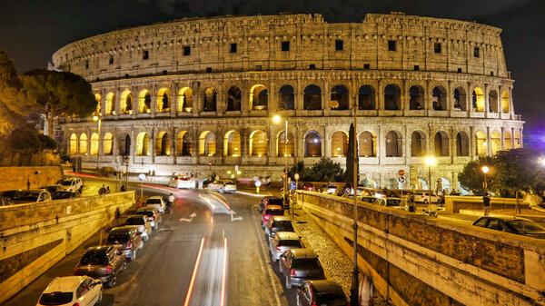 Colosseum with ruins of famous roman forum in rome, italy
