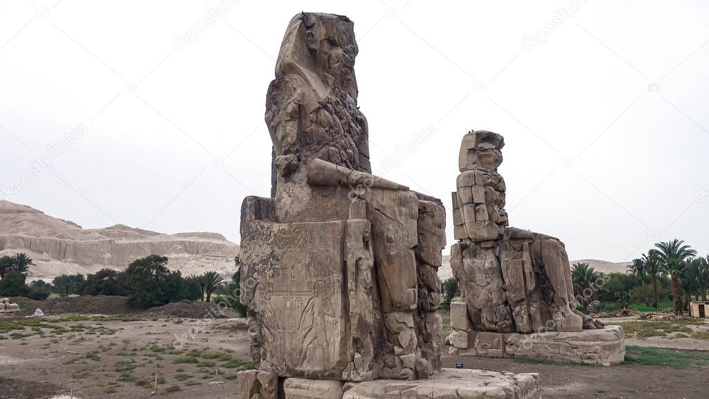 Colossi of Memnon are two massive stone statues of Pharaoh Amenhotep II in Luxor, Egypt
