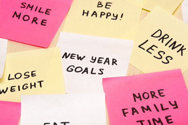 Popular new year goals or resolutions on colorful sticky blank n