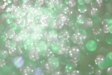 Tatil soyut yeşil glitter arka plan blinki ile defocused