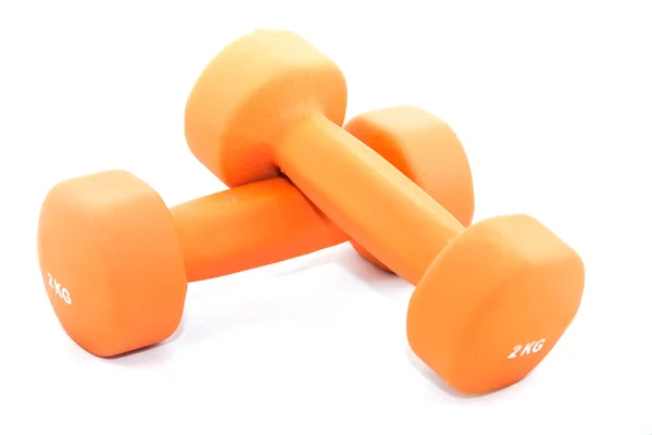 Two orange dumbbells isolated on white background — Stock Photo, Image