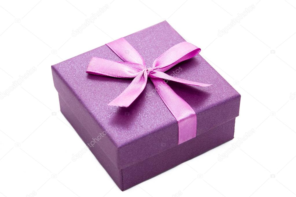 Violet gift box with ribbon isolated on white background
