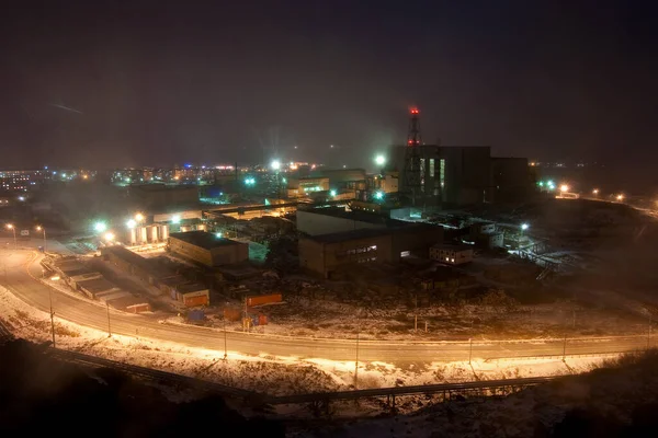 Night industrial landscape with thermal power station. A large power plant in the far North in the Arctic. Location place: city of Anadyr, Chukotka, Siberia, Far East of Russia.