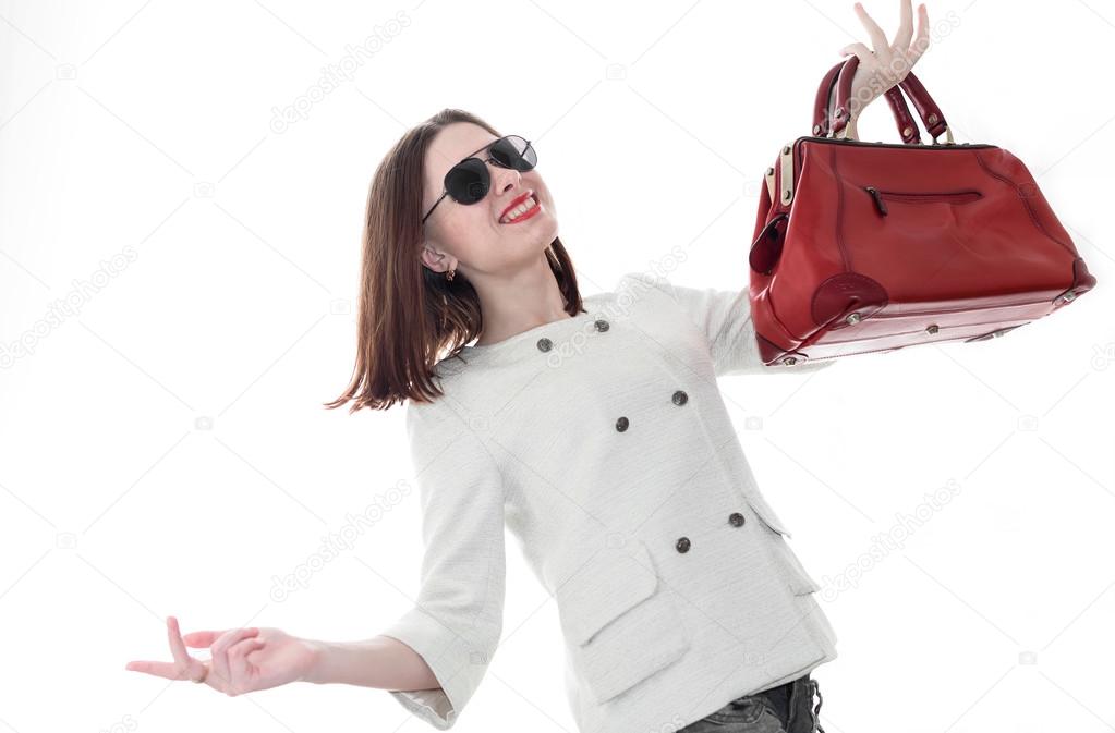 woman with red handbag in hands