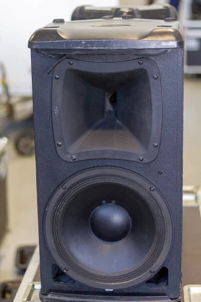 Sound amplifier used in musical concerts placed in the rehearsal room of a rock group