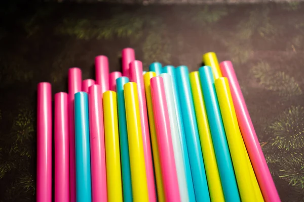 colourful cocktails straws on the table