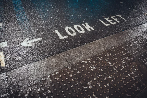 Looking Wet Pavement Look Left Cross Walk Sign Festett Utcákon — Stock Fotó