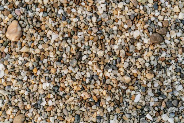 Die Textur von grobem Sand in der Nähe. Makro. — Stockfoto